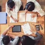 Freelancers working on shared office spaces